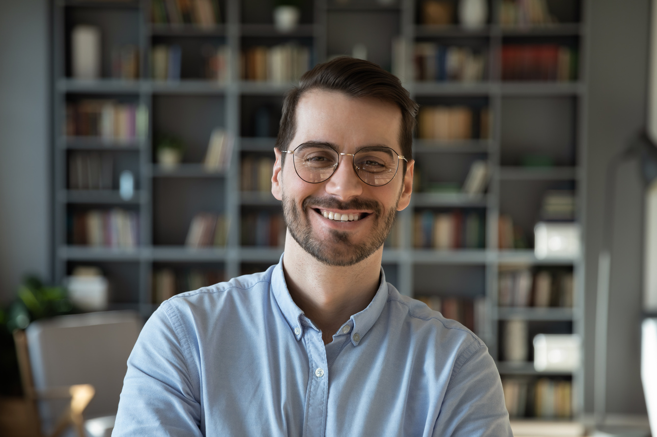 Profile picture of smiling 30s Caucasian man in glasses